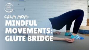 Fitness trainer performing a glute bridge